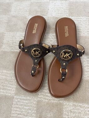 MICHAEL Michael Kors Brown and Gold Logo Thong Sandals